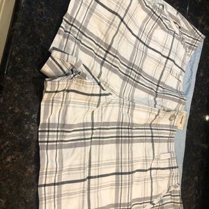 Plaid shorts that are white black and gray